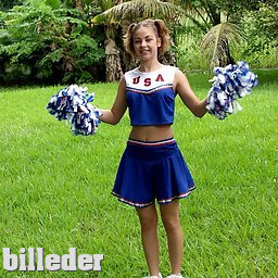 Cute Cheerleader does her movies outdoor before taking off her uniform and buffing her pussy